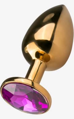 All EasyToys Anal - Metal Butt Plug No. 1 - Gold/Purple - Polished gold Buttplug delivers firm, cool-to-warm sensations, and cleans up in seconds. Secure flared base and tapered tip make insertion feel easy, steady, and sparkly.